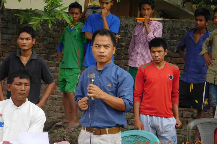 Principal Lalboi giving a speech